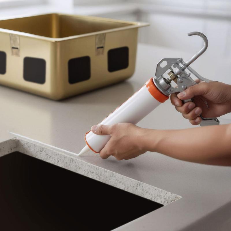 Adeziv siliconic fără acid pentru montarea chiuvetelor din oțel inoxidabil sub blat