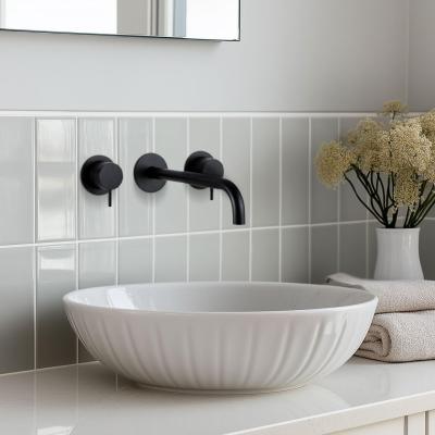 Ce trebuie tradus în română este următorul text: Robinet incorporat Waterevolution Flow cu 3 găuri pentru chiuvetă, de culoare neagră mată, cu băț de 25 cm T1163FPR-25.