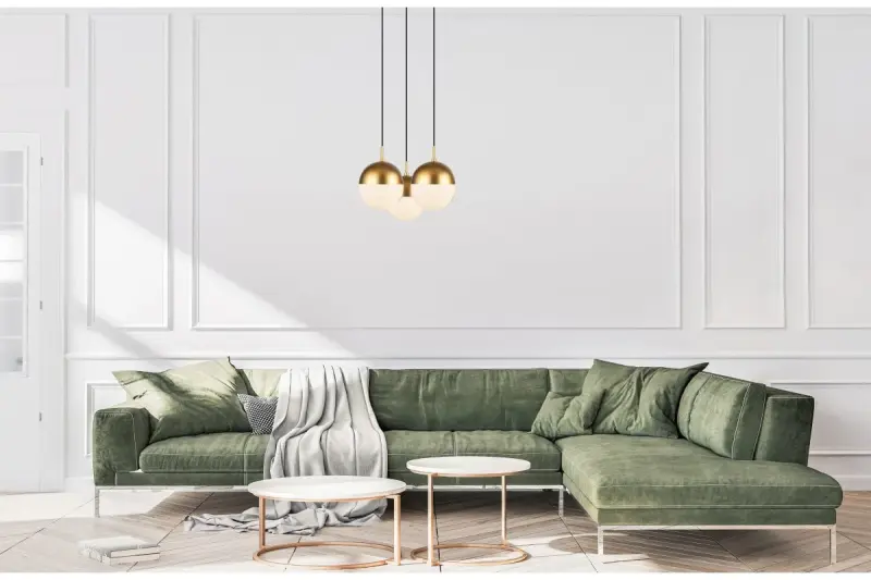 Decorațiunea Abies este un candelabru modern cu sârmă de cupru aurită și o abajur rotund din metal.